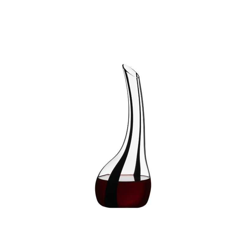 Onyx glass decanter with dark wine fill and curved teardrop shape