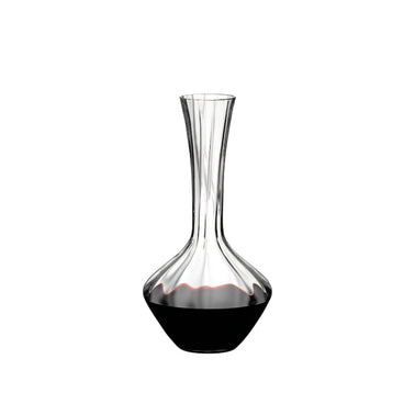 Glass wine decanter with narrow neck and dark red liquid, clear crystal finish