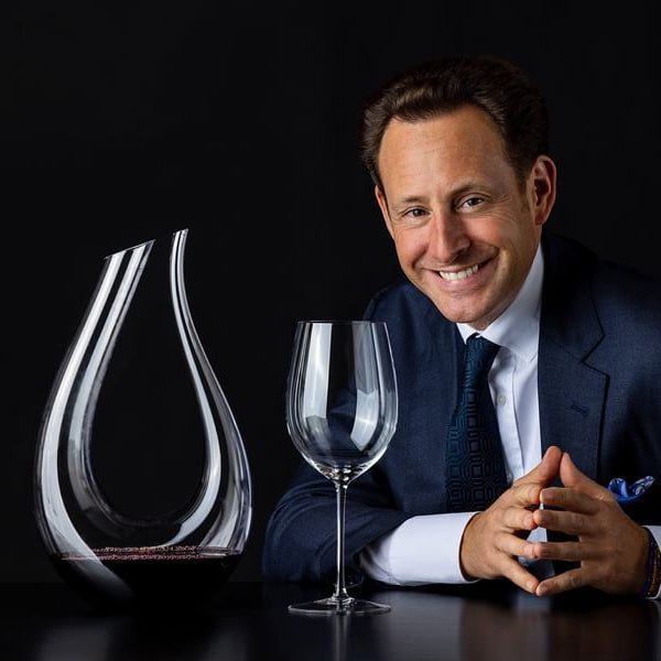 Glass wine decanter and stemmed wine glass, clear with dark amber base
