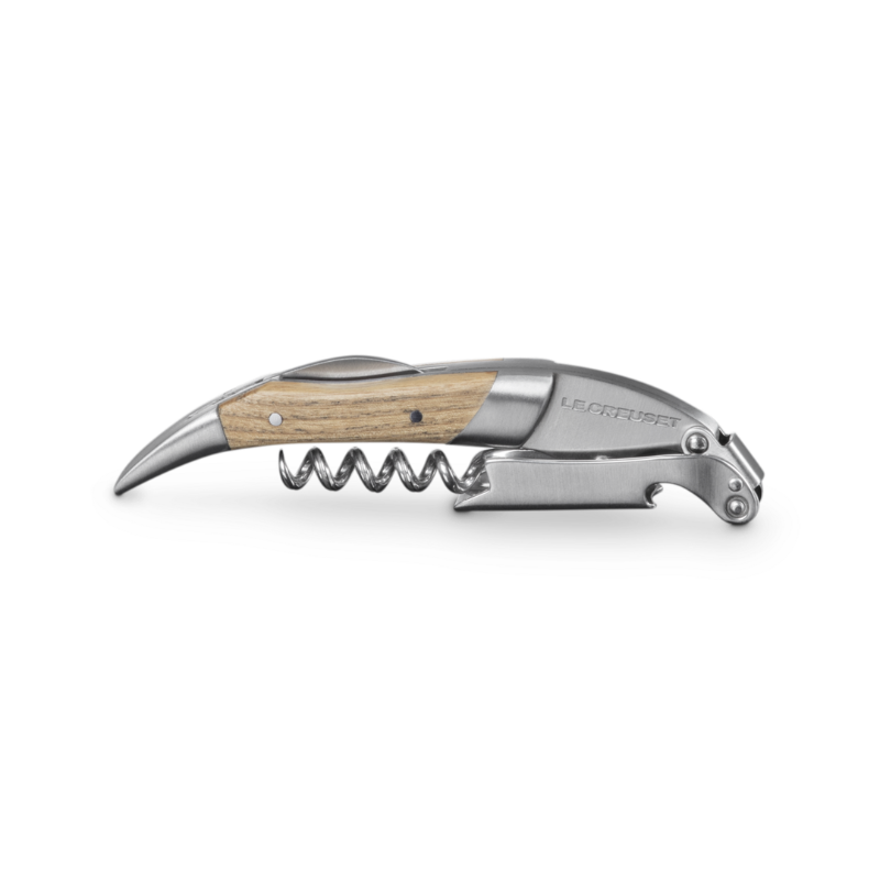Corkscrew with wooden handle on a white background