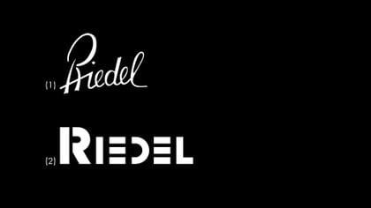 Riedel trademark etching on glass base showing handmade signature script and machine-made block capitals